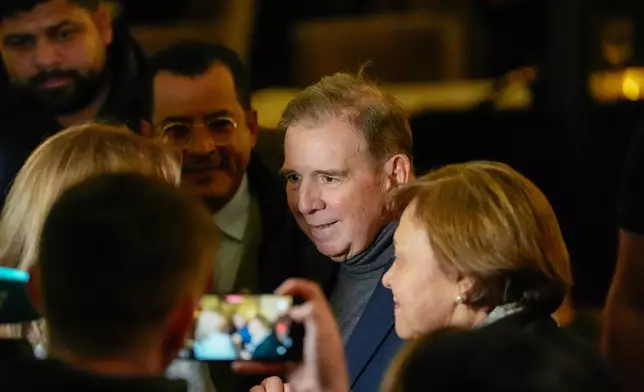 The Venezuelan opposition's presidential candidate in the 2024 presidential election, Edmondo Gonzales, center, at the Grand Hotel in Oslo, Norway, Tuesday, Dec. 9, 2025. (Lise Aserud/NTB via AP)