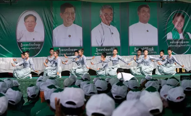 Supporters of the military-backed Union Solidarity and Development Party (USDP) sing songs during election campaign in Pyawbwe Township, Mandalay Division, central Myanmar, Thursday, Dec. 25, 2025. (AP Photo/Aung Shine Oo)