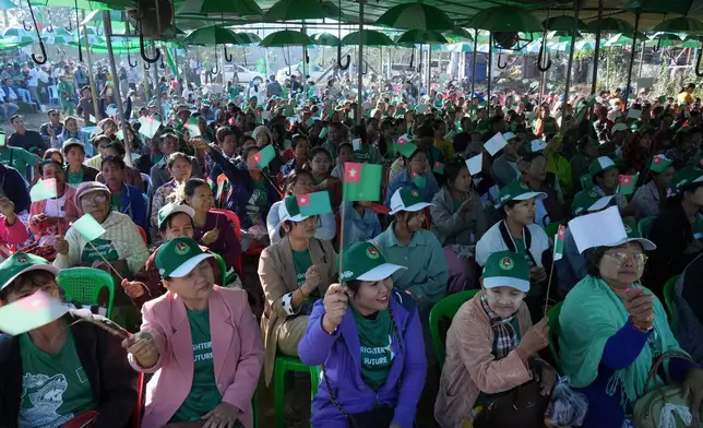 Supporters of the military-backed Union Solidarity and Development Party (USDP) gather for the final day of campaign for the first phase of a general election in Naypyitaw, Myanmar, Friday, Dec. 26, 2025. (AP Photo/Aung Shine Oo)