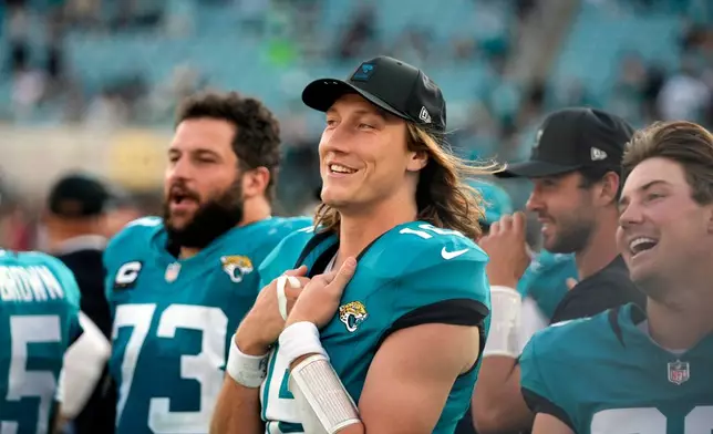Jacksonville Jaguars quarterback Trevor Lawrence (16) looks on during the second half against the New York Jets an NFL football game, Sunday, Dec. 14, 2025, in Jacksonville, Fla. (AP Photo/John Raoux)