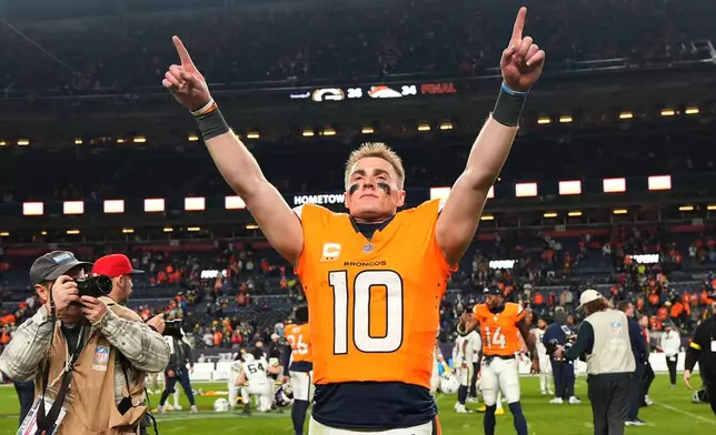 Denver Broncos' Bo Nix celebrates after an NFL football game against the Green Bay Packers Sunday, Dec. 14, 2025, in Denver. (AP Photo/Jack Dempsey)