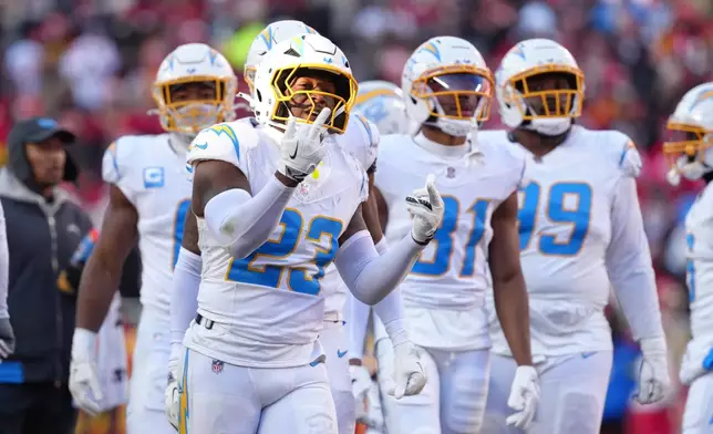 EDS NOTE: OBSCENITY - Los Angeles Chargers safety Tony Jefferson gestures before being ejected during the second half of an NFL football game against the Kansas City Chiefs, Sunday, Dec. 14, 2025, in Kansas City, Mo. (AP Photo/Ed Zurga)