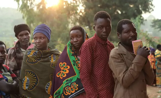 Voters line up to cast their votes in the Burundian legislative elections at Musama Primary School, in Gitega, Burundi, June 5, 2025. (AP Photo/Berthier Mugiraneza, File)
