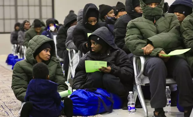 Around 180 Nigerian migrants wait before being deported from Tripoli, Libya, March 18, 2025. (AP Photo/Yousef Murad, File)