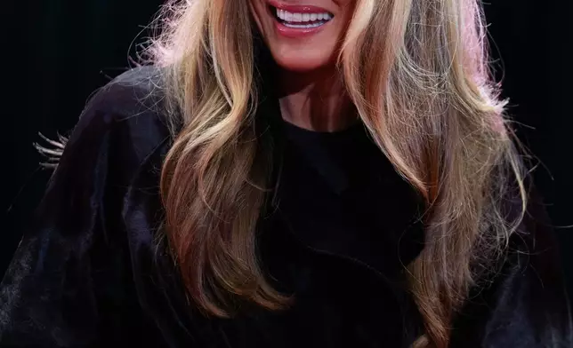 First lady Melania Trump talks to children and their families at Children's National Hospital, Friday, Dec. 5, 2025, in Washington. (AP Photo/Allison Robbert)