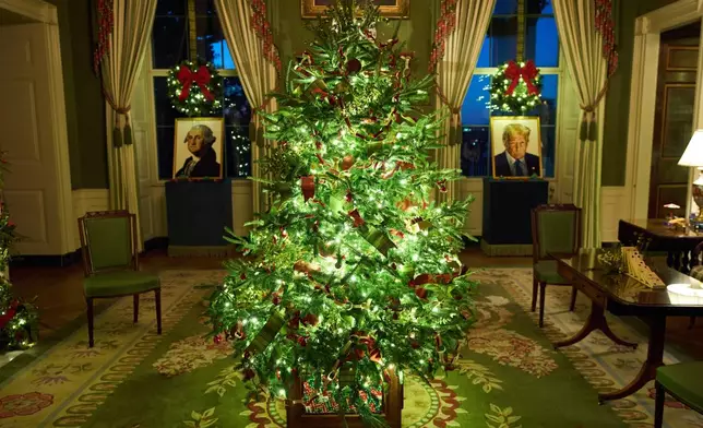 FILE - Lego portraits of both President George Washington and President Donald Trump decorate the Green Room as part of the White Christmas theme "Home is Where the Heart Is," during a press preview in Washington, Dec. 1, 2025. (AP Photo/Evan Vucci, File)