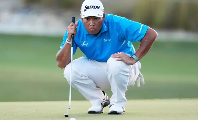 Hideki Matsuyama, of Japan, studies his putt on the 18th hole during the third round of the Hero World Challenge PGA Tour at Albany Golf Club in New Providence, Bahamas, Saturday, Dec. 6, 2025. (AP Photo/Fernando Llano)