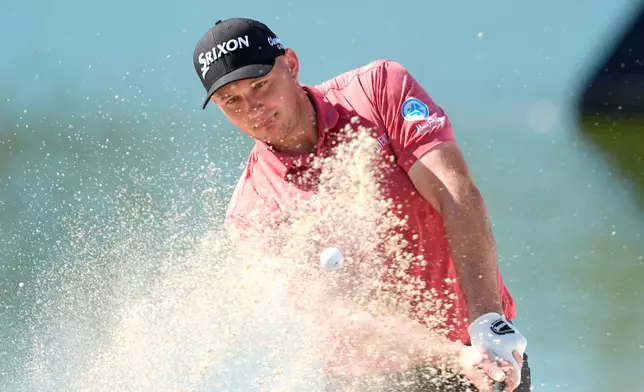 Sepp Straka, of Austria, watches his hit from the sand on the 6th hole during the third round of the Hero World Challenge PGA Tour at the Albany Golf Club, in New Providence, Bahamas, Saturday, Dec. 6, 2025. (AP Photo/Fernando Llano)