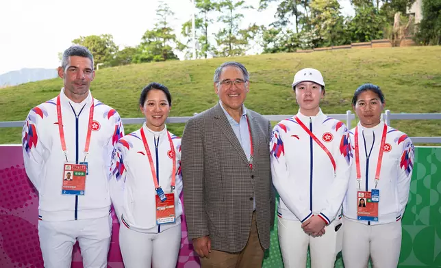 Hong Kong Jockey Club Vice-chairman Lester Huang (middle ) attends the show jumping group competition, one of the equestrian events at the 15th National Games, and cheers on Hong Kong athletes.