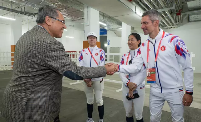 Hong Kong Jockey Club Vice-chairman Lester Huang attends the show jumping group competition, one of the equestrian events at the 15th National Games, and cheers on Hong Kong athletes.