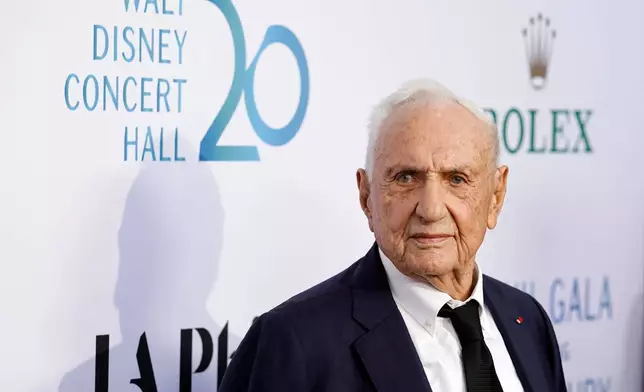 FILE - Honoree and Walt Disney Concert Hall architect Frank Gehry poses at the 2023 Los Angeles Philharmonic Gala, Thursday, Oct. 5, 2023, at Walt Disney Concert Hall in Los Angeles. (AP Photo/Chris Pizzello, File)