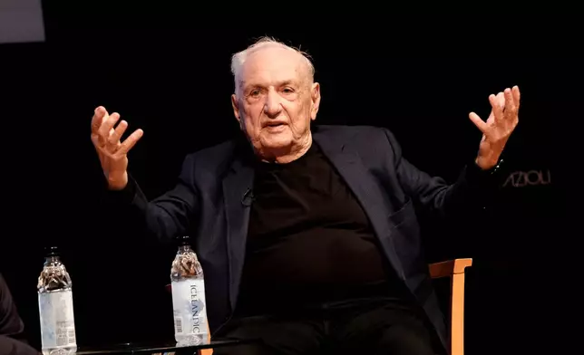 FILE - Architect Frank Gehry describes his concert hall design at the Colburn School during an unveiling in downtown Los Angeles on Wednesday, March 16, 2022. (AP Photo/Richard Vogel, File)