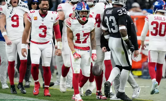 New York Giants wide receiver Wan'Dale Robinson (17) reacts to a play during the first half of an NFL football game against the Las Vegas Raiders Sunday, Dec. 28, 2025, in Las Vegas. (AP Photo/John Locher)