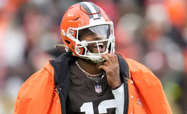 Cleveland Browns quarterback Shedeur Sanders reacts on the sideline during the first half of an NFL football game against the San Francisco 49ers, Sunday, Nov. 30, 2025, in Cleveland. (AP Photo/Sue Ogrocki)