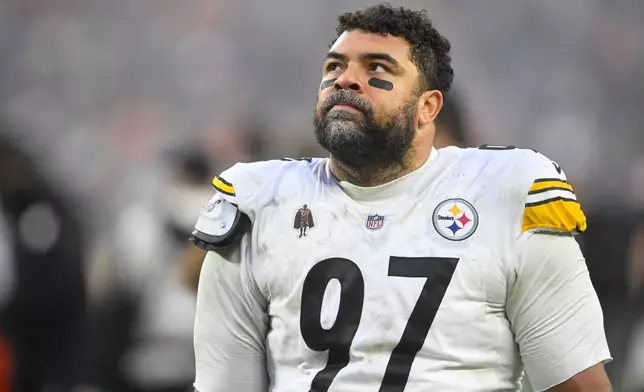 Pittsburgh Steelers defensive tackle Cameron Heyward walks off the field after an NFL football game against the Cleveland Browns, Sunday, Dec. 28, 2025, in Cleveland. (AP Photo/David Richard)