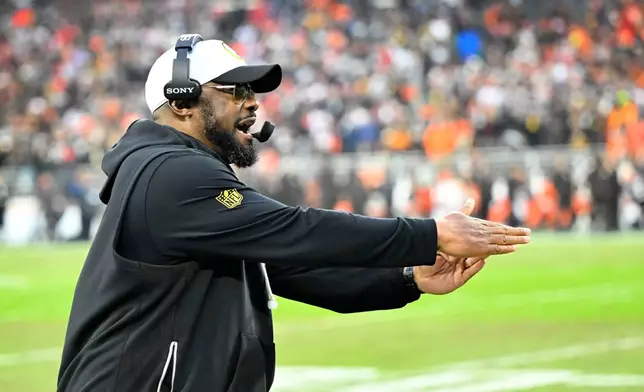Pittsburgh Steelers head coach Mike Tomlin calls a timeout during the second half of an NFL football game against the Cleveland Browns, Sunday, Dec. 28, 2025, in Cleveland. (AP Photo/David Richard)