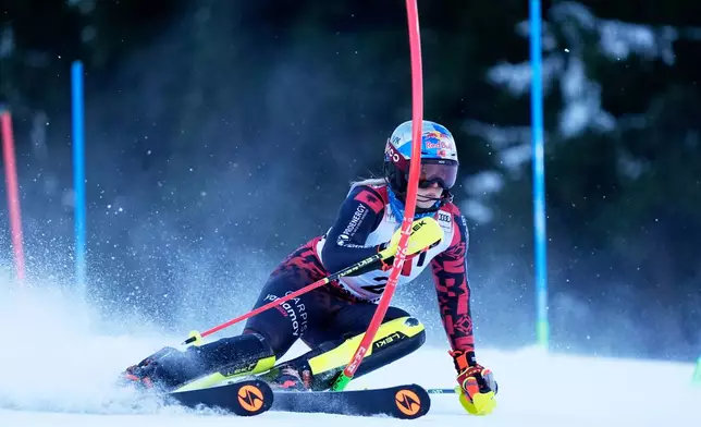 Albania's Lara Colturi speeds down the course during an alpine ski, women's World Cup slalom in Semmering, Austria, Sunday, Dec. 28, 2025. (AP Photo/Giovanni Auletta)