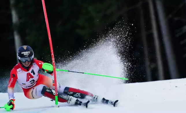 Switzerland's Camille Rast speeds down the course during an alpine ski, women's World Cup slalom in Semmering, Austria, Sunday, Dec. 28, 2025. (AP Photo/Pier Marco Tacca)