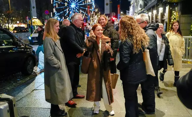 Ana Corina Sosa, center, daughter of Nobel peace prize laureate Maria Machados, arrives at the Grand Hotel in Oslo on Monday, Dec. 8, 2025. (Lise Aserud/NTB via AP)