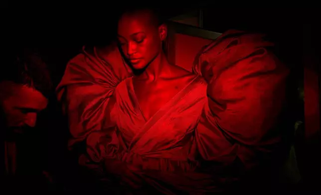 A model wears a design by De La Cierva y Nicolas backstage during Fashion Week in Madrid, Spain, Sept. 19, 2025. (AP Photo/Manu Fernandez, File)