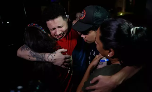 Arturo Suárez, a Venezuelan migrant deported to El Salvador months earlier by the United States under the Trump administration's immigration crackdown, is welcomed home by his relatives in Caracas, Venezuela, on July 22, 2025. (AP Photo/Cristian Hernandez, File)