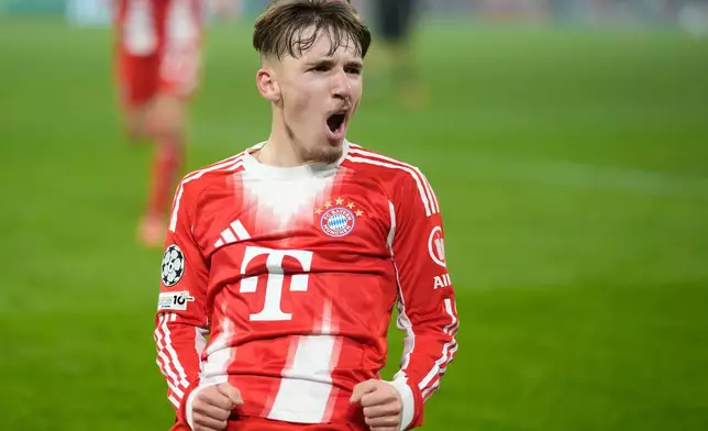 Bayern's Lennart Karl celebrates after scoring his side's second goal during the Champions League opening phase soccer match between FC Bayern Munich and Sporting CP in Munich, Germany, Tuesday, Dec. 9, 2025. (AP Photo/Matthias Schrader)