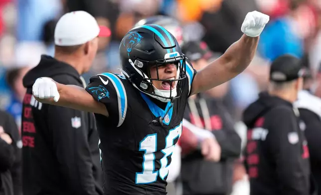 Carolina Panthers wide receiver Jalen Coker celebrates after a catch against the Tampa Bay Buccaneers during the second half of an NFL football game, Sunday, Dec. 21, 2025, in Charlotte, N.C. (AP Photo/Jacob Kupferman)
