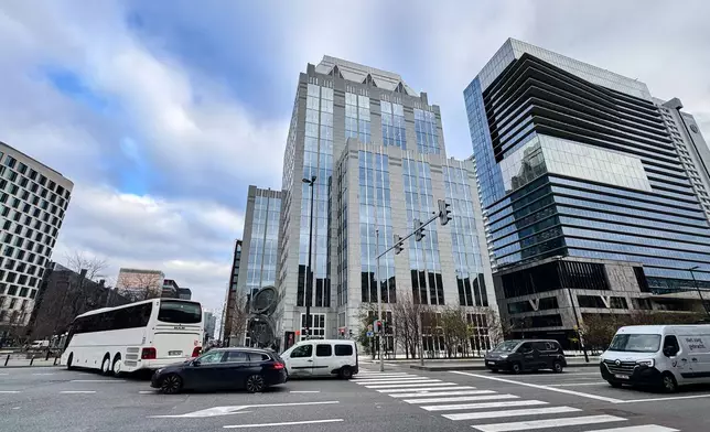 Cars drive past Euroclear headquarters in Brussels, Wednesday, Dec. 3, 2025. (AP Photo/Sylvain Plazy)