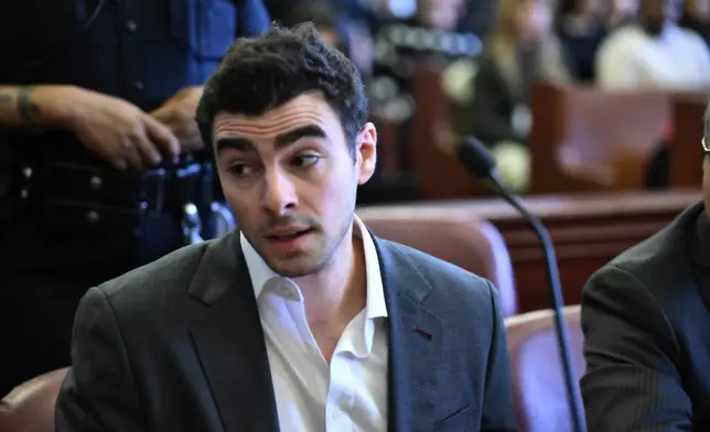 Luigi Mangione appears in Manhattan Criminal Court for an evidence hearing, Thursday, Dec. 4, 2025, in New York. (Curtis Means /Pool Photo via AP)