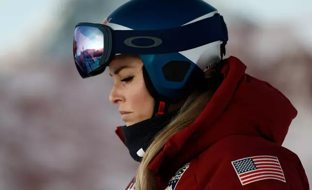 United States' Lindsey Vonn looks on ahead of an alpine ski, women's World Cup downhill in St. Moritz, Switzerland, Friday Dec. 12, 2025. (AP Photo/Gabriele Facciotti)