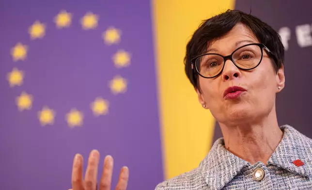 EU Commissioner for Enlargement Marta Kos seeks during joint press conference with Ukraine's Deputy Prime Minister for European and Euro-Atlantic Integration of Ukraine Taras Kachka and Marie Bjerre, Danish Minister for European Affairs, after informal meeting of EU ministers for European affairs in Lviv, Ukraine, on Thursday, Dec. 11, 2025. (AP Photo/Evgeniy Maloletka)