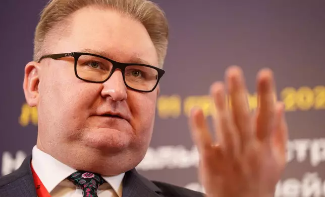 Ukraine's Deputy Prime Minister for European and Euro-Atlantic Integration of Ukraine Taras Kachka attends a joint press conference with Marie Bjerre, Danish Minister for European Affairs and Marta Kos, EU Commissioner for Enlargement, after informal meeting of EU ministers for European affairs in Lviv, Ukraine, on Thursday, Dec. 11, 2025. (AP Photo/Evgeniy Maloletka)