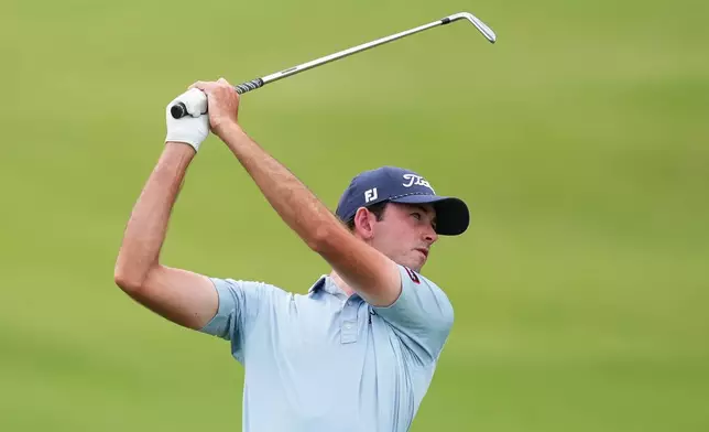 Elvis Smylie plays an approach shot on the ninth Hole during the first round of the Australian Open golf tournament in Melbourne, Australia, Thursday, Dec. 4, 2025. (AP Photo/Asanka Brendon Ratnayake)