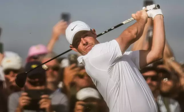 Rory McIlroy, of Northern Ireland, tees off the 12th Hole during the first round of the Australian Open golf tournament in Melbourne, Australia, Thursday, Dec. 4, 2025. (AP Photo/Asanka Brendon Ratnayake)