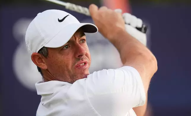 Rory McIlroy, of Northern Ireland, tees off the 11th hole during the first round of the Australian Open golf tournament in Melbourne, Australia, Thursday, Dec. 4, 2025. (AP Photo/Asanka Brendon Ratnayake)