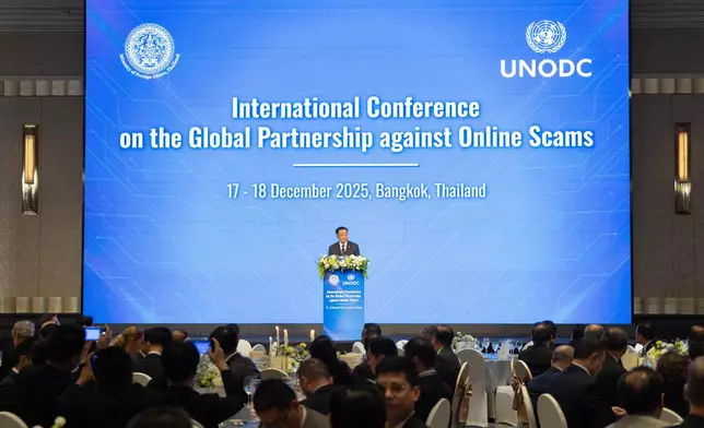 Thai Prime Minister Anutin Charnvirakul delivers his keynote speech during the International Conference on the Global Partnership against Online Scams in Bangkok, Thailand, on Wednesday, Dec. 17, 2025. (AP Photo/Anton L. Delgado)
