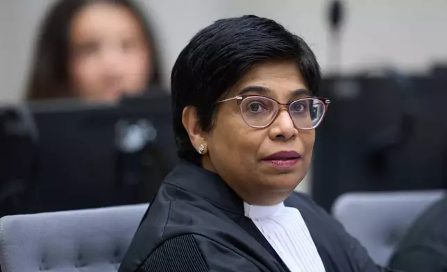 Deputy Prosecutor of the International Criminal Court Nazhat Shameem Khan waits to hear the verdict of the International Criminal Court, ICC, for Ali Muhammad Ali Abd al-Rahman, a leader of the Sudanese Janjaweed militia, in The Hague, Netherlands, Tuesday, Dec. 9, 2025. (AP Photo/Peter Dejong, Pool)