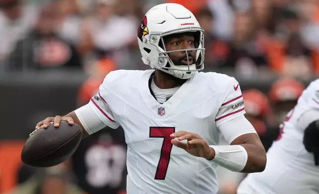 Arizona Cardinals quarterback Jacoby Brissett looks to throw during the first half of an NFL football game against the Cincinnati Bengals, Sunday, Dec. 28, 2025, in Cincinnati. (AP Photo/Joshua A. Bickel)