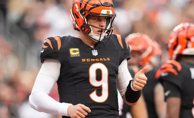 Cincinnati Bengals quarterback Joe Burrow reacts during the first half of an NFL football game against the Arizona Cardinals, Sunday, Dec. 28, 2025, in Cincinnati. (AP Photo/Jeff Dean)