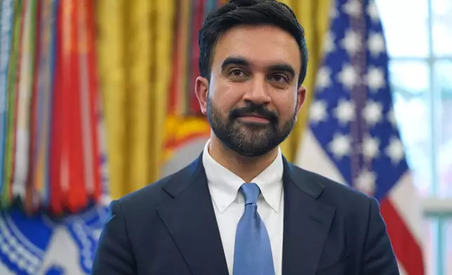 FILE - New York City Mayor-elect Zohran Mamdani listens as President Donald Trump speaks in the Oval Office of the White House, Friday, Nov. 21, 2025, in Washington. (AP Photo/Evan Vucci, File)