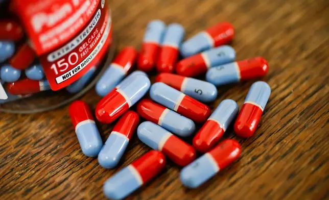 FILE - Generic acetaminophen capsules are shown Wednesday, Dec. 18, 2019, in Santa Ana, Calif. (AP Photo/Chris Carlson, File)