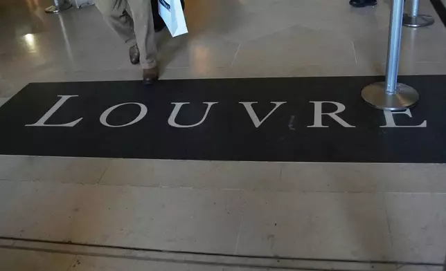 FILE - A carpet at Le Louvre museum, Wednesday, Nov. 19, 2025 in Paris. (AP Photo/Christophe Ena, File)
