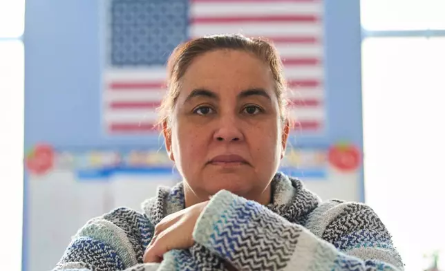 Edelmira Kitchen, a teaching artist at CentroNia, poses for a portrait in a classroom at CentroNia in Washington, Tuesday, Dec. 9, 2025. (AP Photo/Jacquelyn Martin)