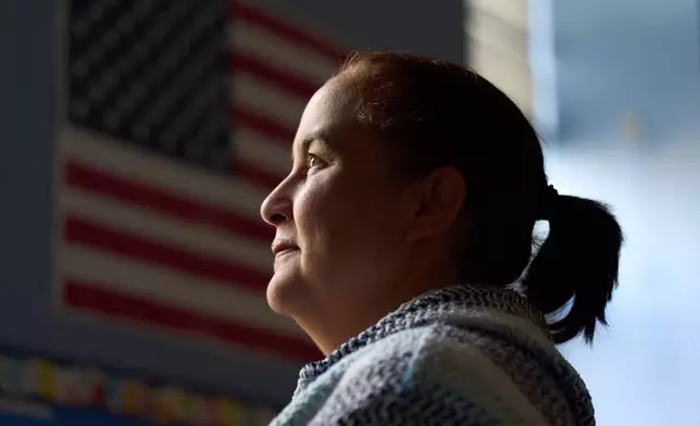 Edelmira Kitchen, a teaching artist at CentroNia, poses for a portrait in a classroom at CentroNia in Washington, Tuesday, Dec. 9, 2025. (AP Photo/Jacquelyn Martin)