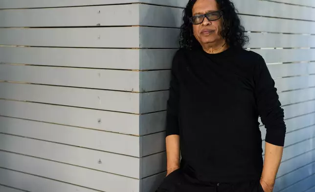 Izhar Cohen, an Israeli singer who won the 1978 Eurovision song contest poses for a photo in Tel Aviv, Israel, Friday, Dec. 5, 2025. (AP Photo/Oded Balilty)