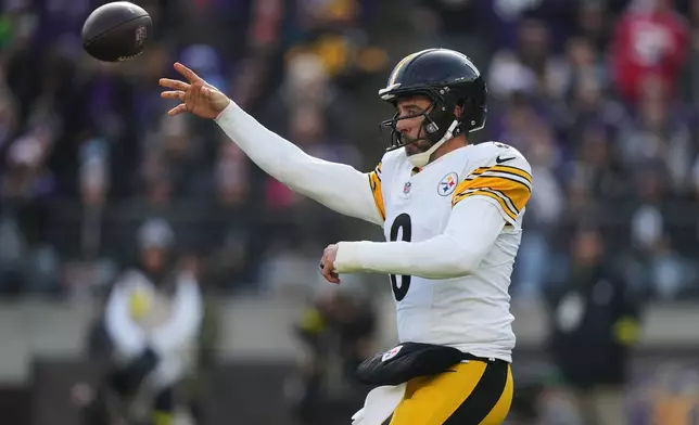 Pittsburgh Steelers quarterback Aaron Rodgers throws during the first half of an NFL football game against the Baltimore Ravens, Sunday, Dec. 7, 2025, in Baltimore. (AP Photo/Stephanie Scarbrough)
