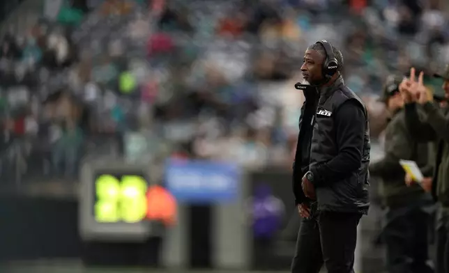 New York Jets head coach Aaron Glenn watches play from the sidelines during the fourth quarter of an NFL football game, Sunday, Dec. 7, 2025, in East Rutherford, N.J. (AP Photo/Adam Hunger)