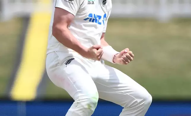 New Zealand's Matt Henry celebrates the wicket of West Indies' Roston Chase on Day 4 of their cricket test match in Christchurch, New Zealand, Friday, Dec. 5, 2025. (Chris Symes/Photosport via AP)