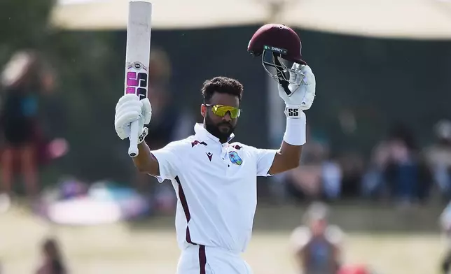 West Indies' Shai Hope celebrates scoring 100 runs against New Zealand on Day 4 of their cricket test match in Christchurch, New Zealand, Friday, Dec. 5, 2025. (Chris Symes/Photosport via AP)