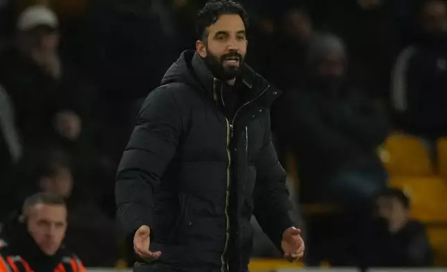 Manchester United's head coach Ruben Amorim reacts during the Premier League soccer match between Wolverhampton Wandere and Manchester United in Wolverhampton, England Monday, Dec. 8, 2025. (AP Photo/Dave Shopland)